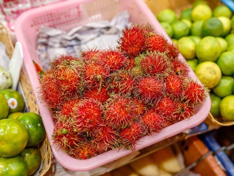 rambutan fruits in a thai market