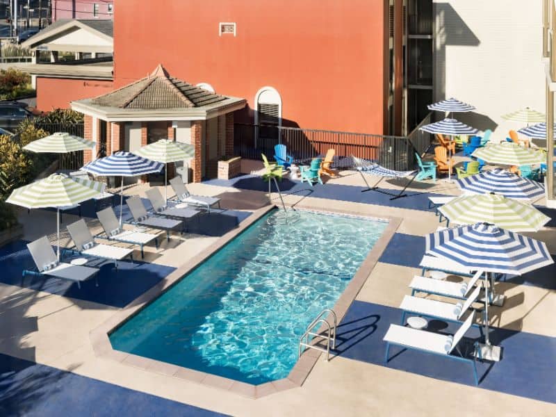 outdoor pool with sun loungers
